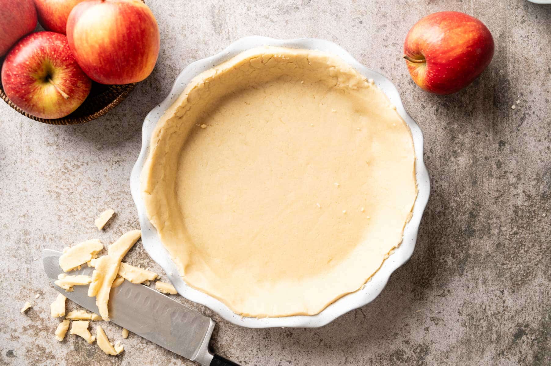 Pie pan lined with homemade vegan pie crust.